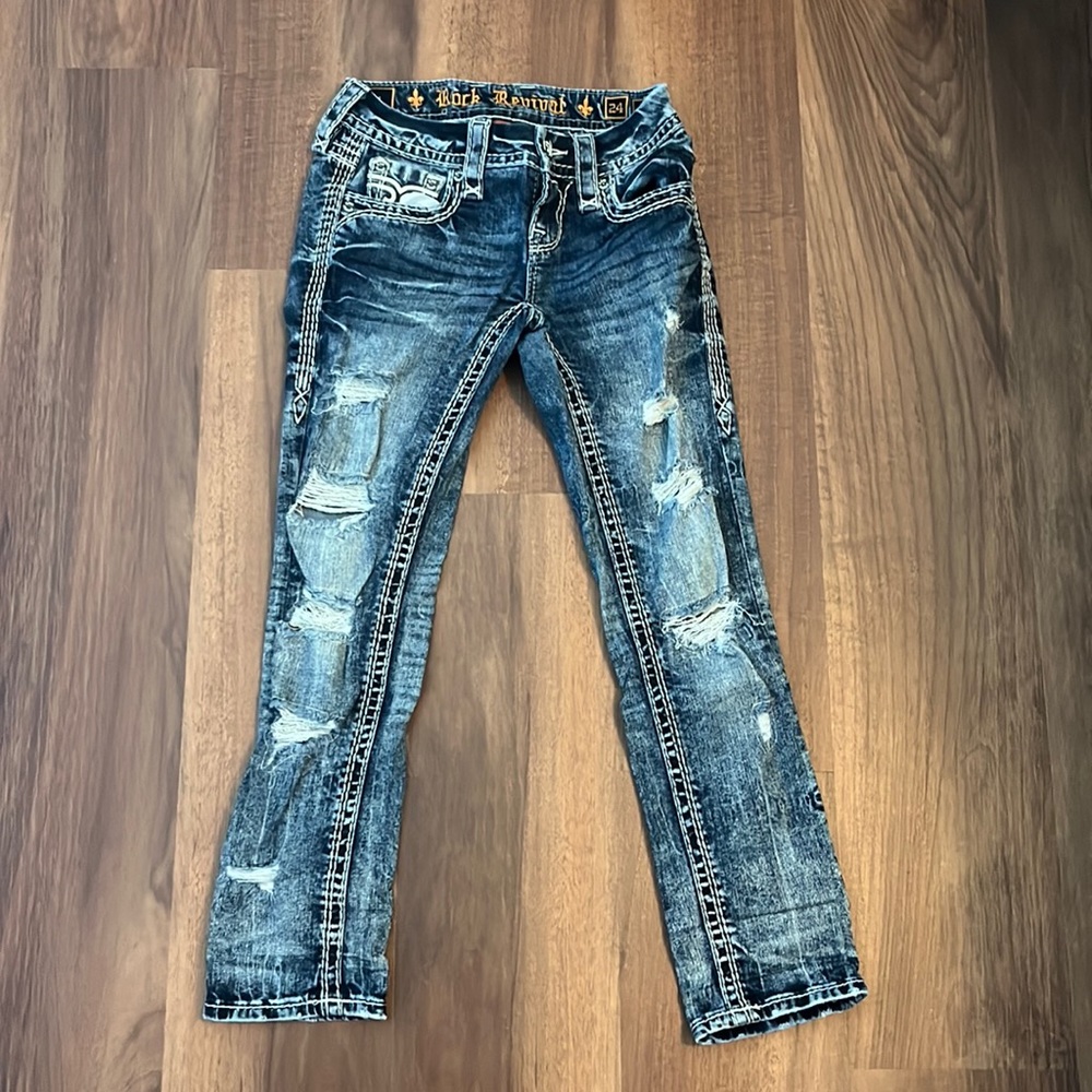 Size 24 rock revival distressed crop.  The inseam on these is also 24 inches.